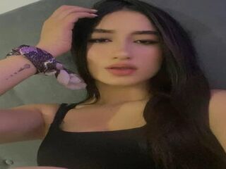 girl fingering shaved pussy EvelynFontain